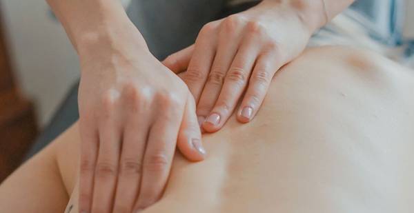 massage health benefits hands massaging back