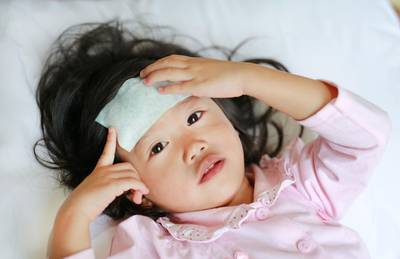 asian child with fever