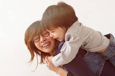 child_hugging_mom_with_glasses.jpg